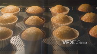 实拍视频纸杯蛋糕进入烤箱烘烤膨胀至焦黄过程