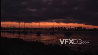 实拍视频夕阳余晖傍晚时分船舶停靠在港湾