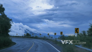 晴空万里天空下车辆开在盘山公路上的第一人称视觉的高清实拍视频