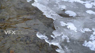 4K冬天冰雪融化河流小溪镜头实拍视频