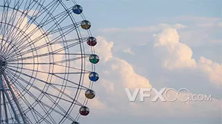 蓝天白云下的摩天轮意境空镜延时实拍视频素材